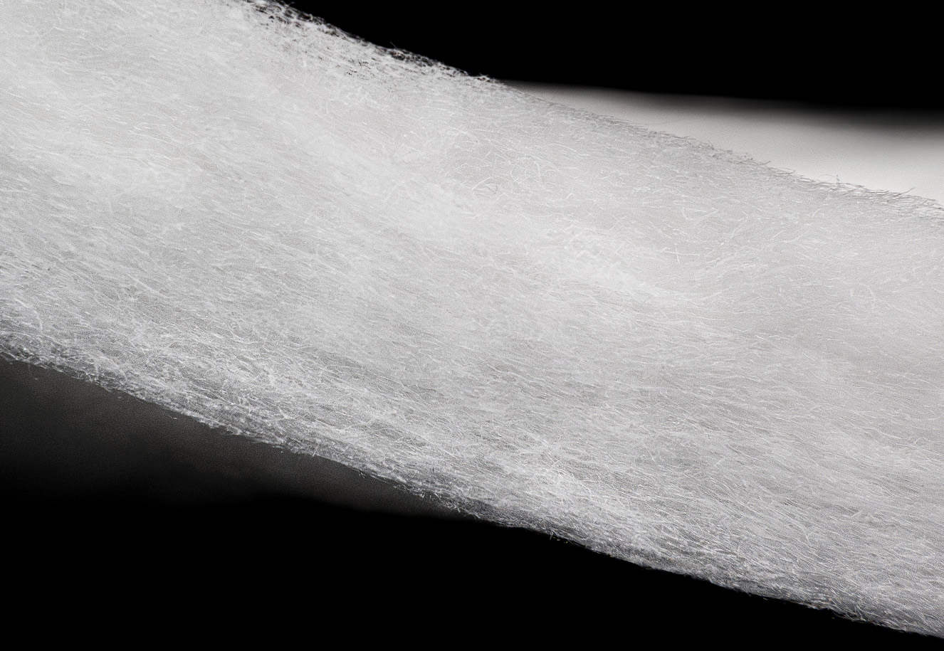 Essential SCU xR: Soft, voluminous insulation made from recycled polyester, providing warmth for various applications.